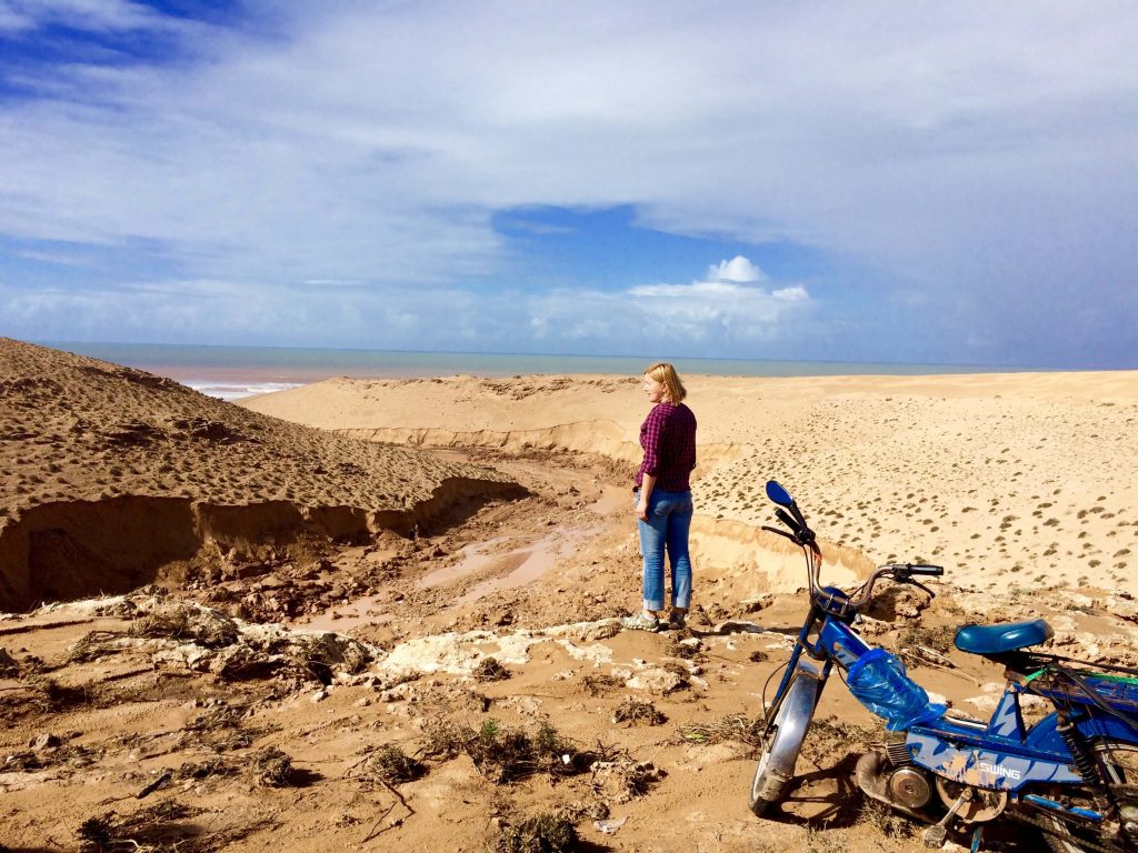 Morocco girl with a motorcycle